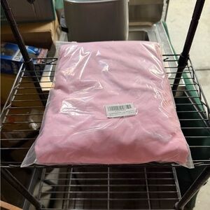 Pink Garment in Packaging